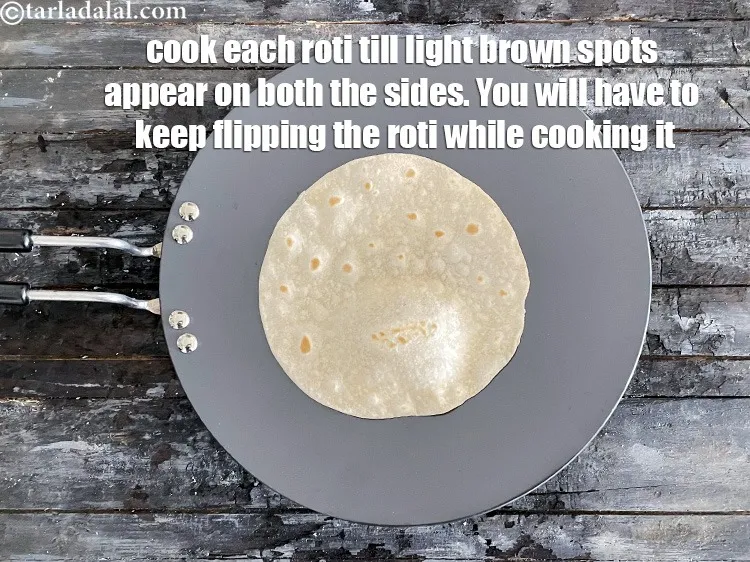 Step 13 – <meta charset="UTF-8" /> Cook each roti till light brown spots appear on both the sides. …