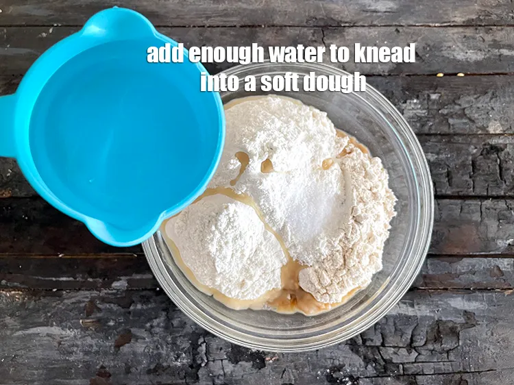 Step 7 – <meta charset="UTF-8" />Add enough water to knead into a soft dough. We first added 1/2 …