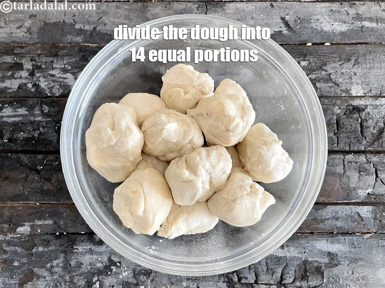 Step 10 – <meta charset="UTF-8" />Divide the dough into 14 equal portions.&nbsp;