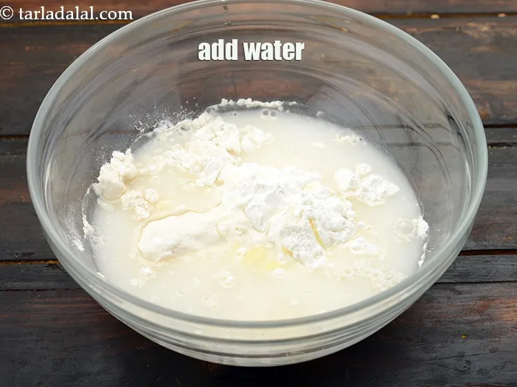 Step 16 – Add&nbsp;1/2 cup&nbsp;<a href="https://www.tarladalal.com/glossary-water-pani-647i">water</a>.