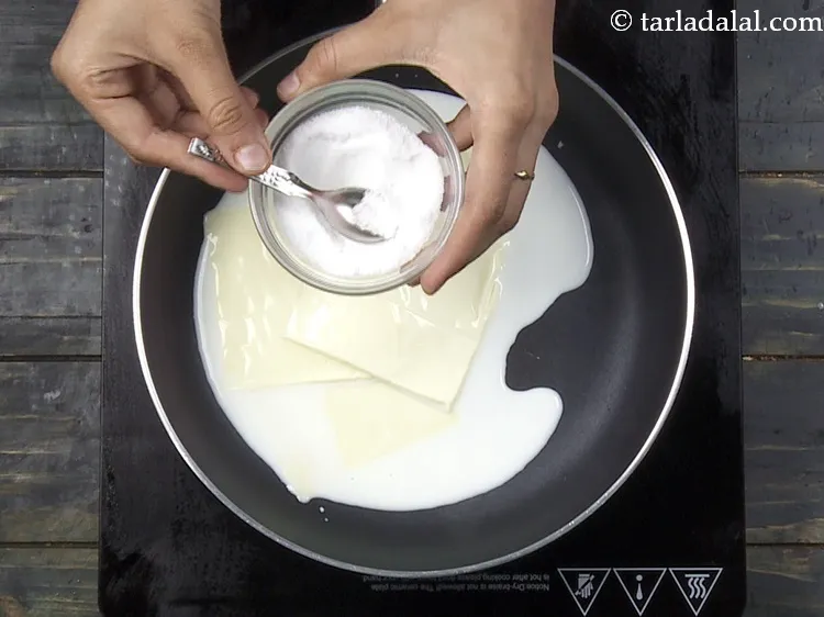 Step 24 – Add a pinch of&nbsp;<a href="https://www.tarladalal.com/glossary-salt-namak-table-salt-418i">salt</a>. The cheese slices have salt, so add salt wisely.