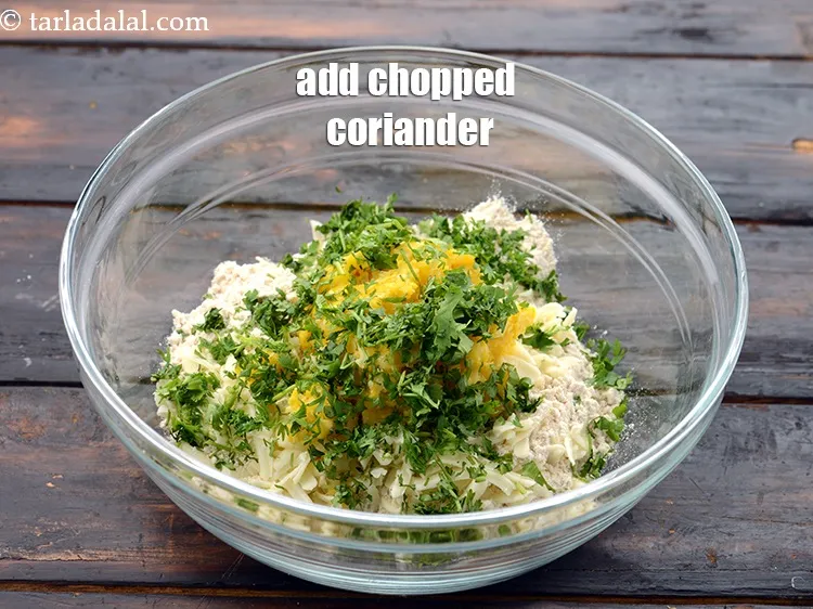 Step 16 – Add 2 tbsp&nbsp;<a href="https://www.tarladalal.com/glossary-chopped-coriander-783i">chopped coriander (dhania)</a>.