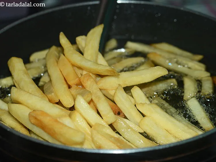 Step 6 – Deep-fry the French fries a few at a time till they turn golden brown and …