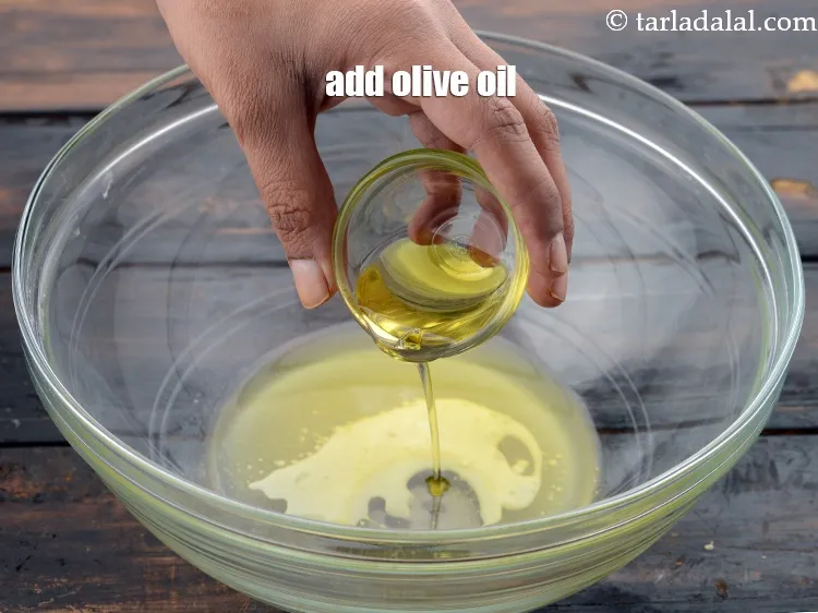 Step 4 – Add 1 tbsp&nbsp;<a href="https://www.tarladalal.com/glossary-olive-oil-451i">olive oil</a>.&nbsp;