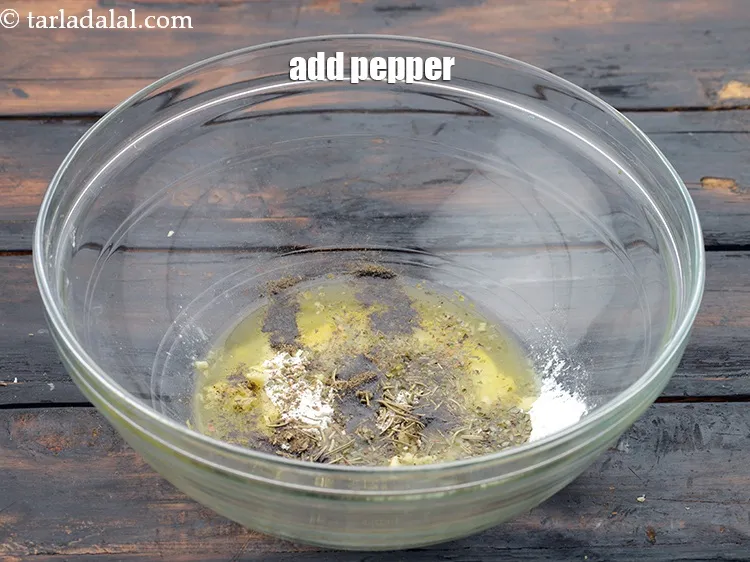 Step 9 – Add 1/2 tsp&nbsp;<a href="https://www.tarladalal.com/glossary-freshly-ground-black-pepper-kalimirch-powder-kali-mirch-ka-powder-567i">freshly ground black pepper (kalimirch)</a>.