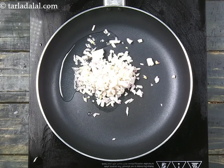 Step 11 – Add 1/4 cup&nbsp;finely&nbsp;<a href="https://www.tarladalal.com/glossary-chopped-onions-722i">chopped onions</a>.