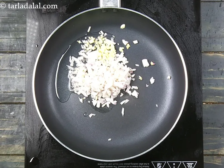 Step 12 – Add 1 tsp&nbsp;finely&nbsp;<a href="https://www.tarladalal.com/glossary-chopped-garlic-790i">chopped garlic (lehsun)</a>.