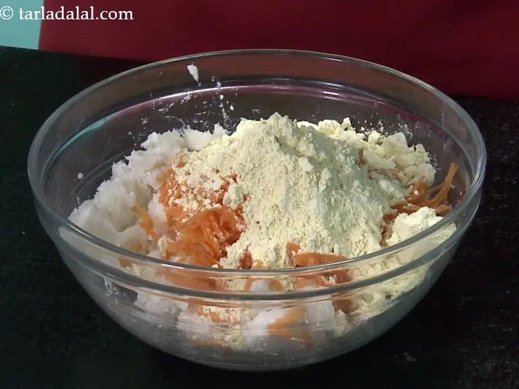 Step 10 – Add 1/2 cup&nbsp;<a href="https://www.tarladalal.com/glossary-besan-chana-dal-flour-bengal-gram-flour-952i">besan (bengal gram flour)</a>.&nbsp;