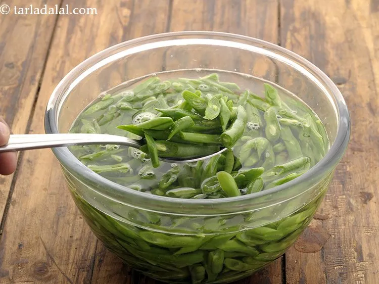 Step 26 – The French beans should be balanced and chana dal should be cooked till they are …