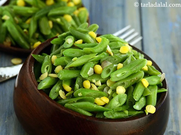 Step 25 – Serve the&nbsp;<strong>French bean and chana dal stir-fry |&nbsp;fansi chana dal stir fry&nbsp;|&nbsp;healthy beans poriyal&nbsp;|&nbsp;</strong>&nbsp;immediately.&nbsp;<a href="https://www.tarladalal.com/Stir-Fried-French-Beans-with-Kalonji-1789r" …