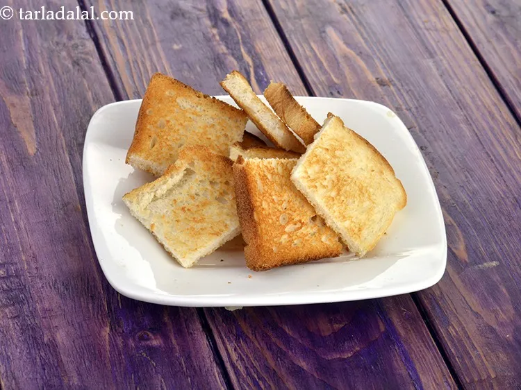 Step 29 – Cut each bread slice into 4 equal square pieces.