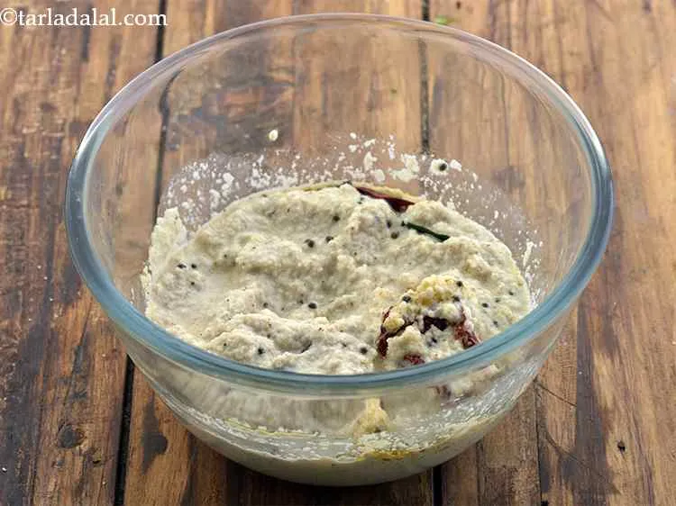 Step 14 – Mix well the fresh <strong>coconut garlic chutney</strong>.