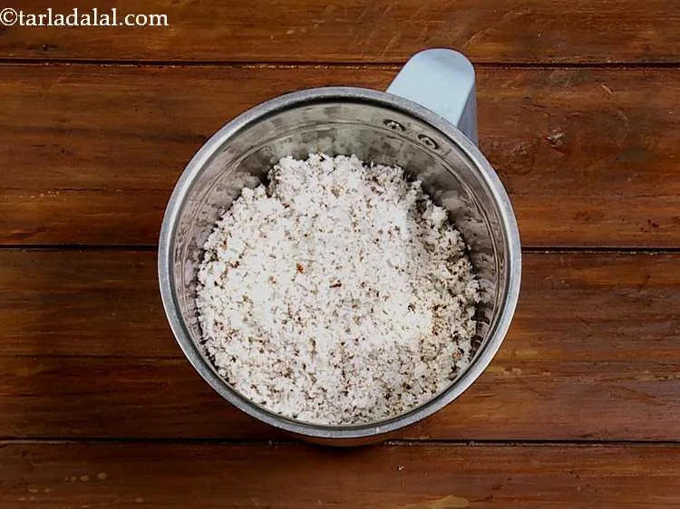 Step 3 – For making the fresh <strong>coconut garlic chutney</strong>, in a mixer jar, add the coconut. Coconut …