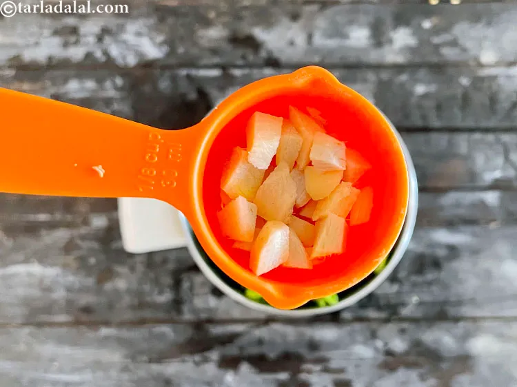 Step 9 – Add&nbsp;<meta charset="UTF-8" />1 tbsp&nbsp;roughly&nbsp;<a href="glossary-chopped-ginger-786i">chopped ginger (adrak)</a>.