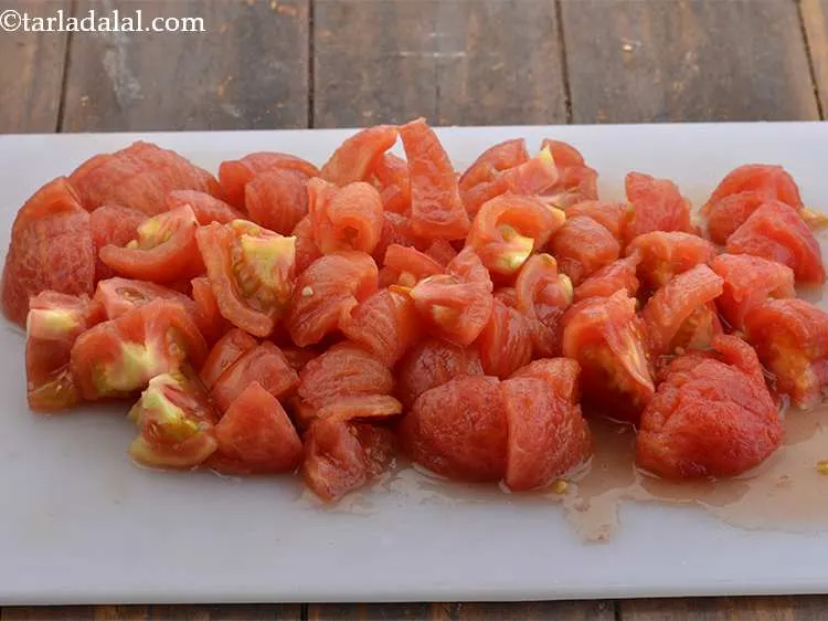 Step 13 – We need chopped tomatoes whitout seeds and skin. The seeds along with the skin are …