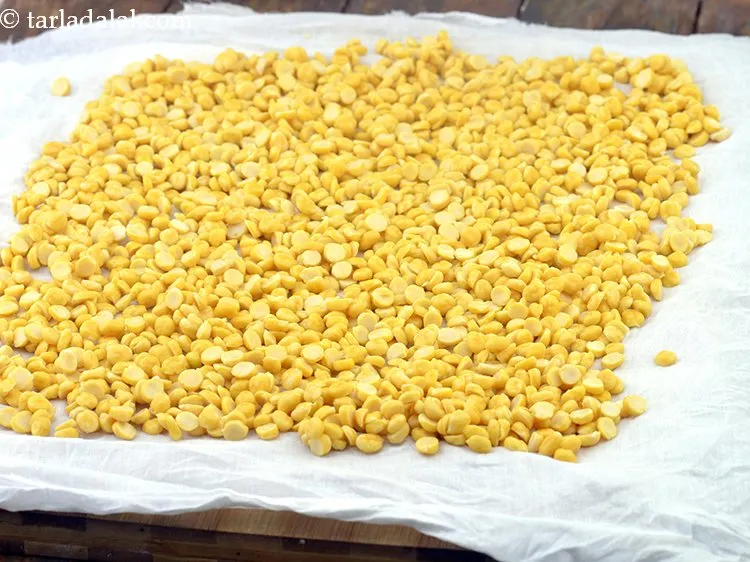 Step 17 – To further ensure that the chana dal is drained well, spread them on a big …