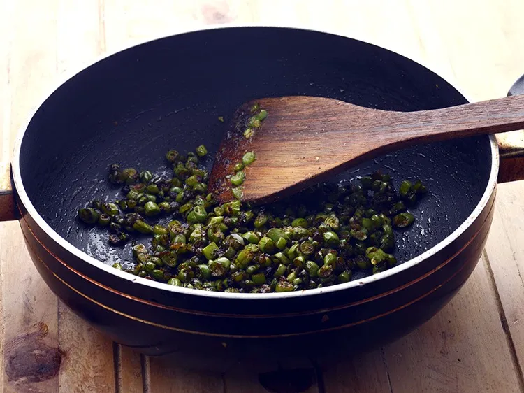 Step 15 – Mix well and saut&eacute; on a medium flame for 30 seconds.