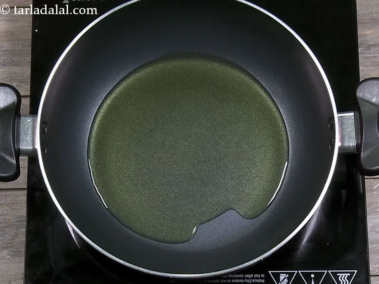 Step 13 – To prepare <strong>carrot halwa</strong>, heat the ghee in a deep non-stick kadhai. Ghee imparts a …