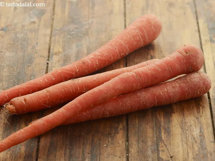 Step 8 – Before we begin making the <strong>quick Gajar Halwa</strong>, clean and wash the carrots. Make use …