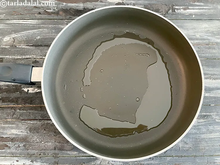 Step 7 – Prefer to use a broad non stick pan so saut&eacute;ing tendli is easier.