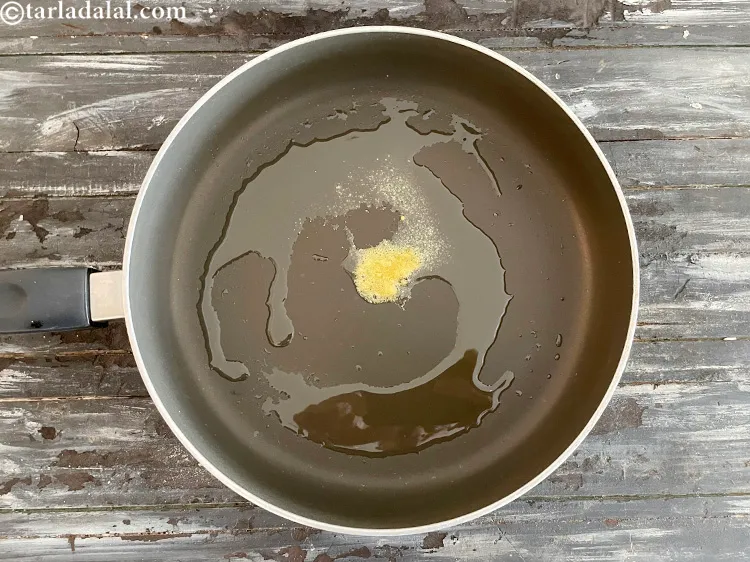 Step 17 – Add&nbsp;<meta charset="UTF-8" />a pinch of&nbsp;<a href="glossary-asafoetida-hing-113i">asafoetida (hing)</a>.