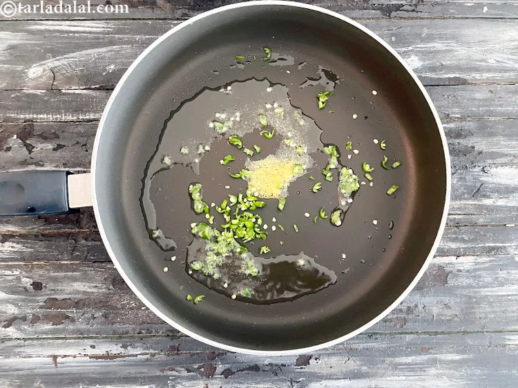 Step 18 – Add&nbsp;<meta charset="UTF-8" />2 tsp&nbsp;finely&nbsp;<a href="glossary-chopped-green-chilli-820i">chopped green chillies</a>.