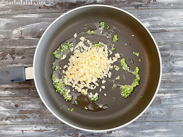 Step 19 – <meta charset="UTF-8" />Add 1/2 cup&nbsp;finely&nbsp;<a href="glossary-chopped-garlic-790i">chopped garlic (lehsun)</a>.