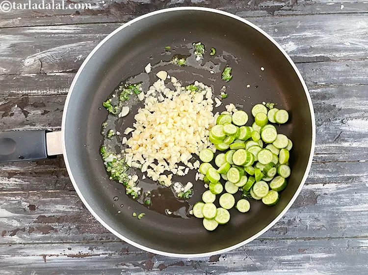 Step 20 – Add&nbsp;<meta charset="UTF-8" />1/2 cup&nbsp;<a href="glossary-tendli-rings-2041i">tendli rings</a>.