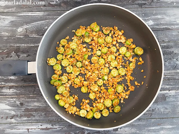Step 24 – Saut&eacute; on a medium flame for 1 minute.