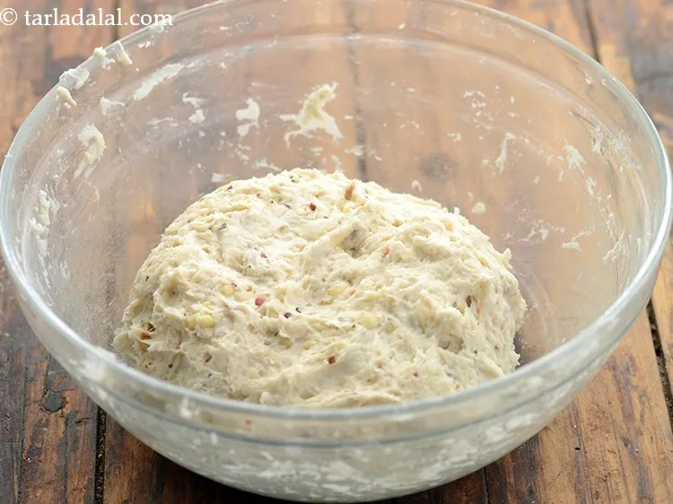 Step 14 – Mix well and knead it into a soft dough using enough warm water. The quantity …