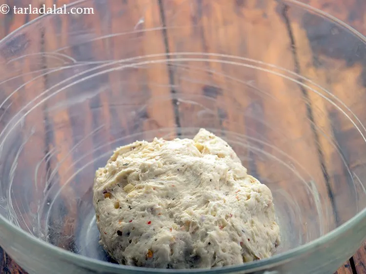 Step 15 – Transfer the dough into a greased bowl.