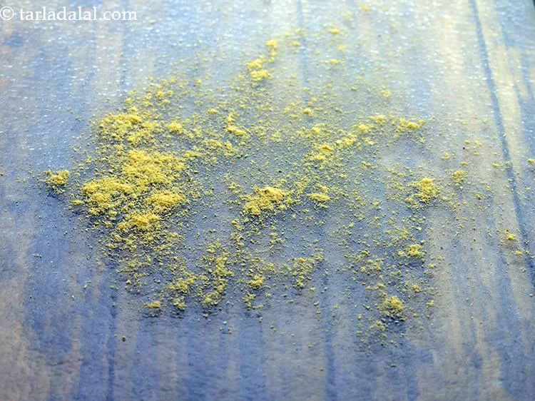 Step 25 – To make<strong> Dominos style garlic bread at home</strong>, dust a clean dry surface with little …