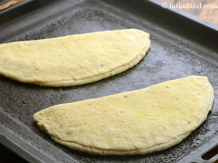 Step 34 – Place them on a baking tray lined with butter paper.