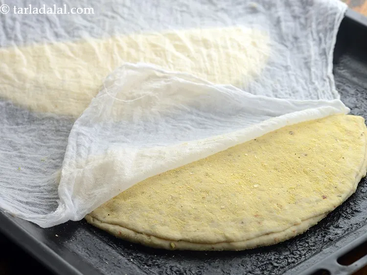 Step 35 – Cover it with a damp muslin cloth and keep aside for 30 minutes. Allowing dough …