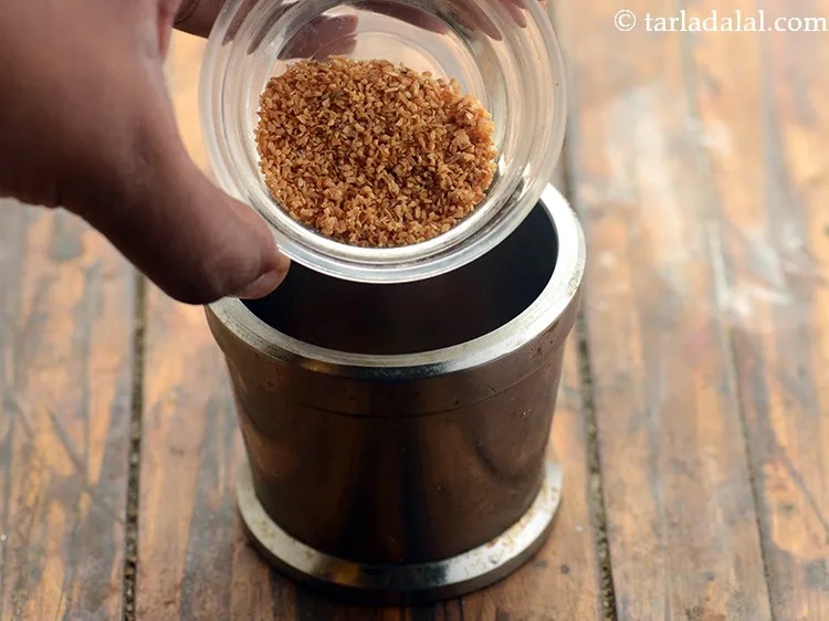 Step 22 – Add 1 tsp garlic (lehsun) powder.&nbsp;