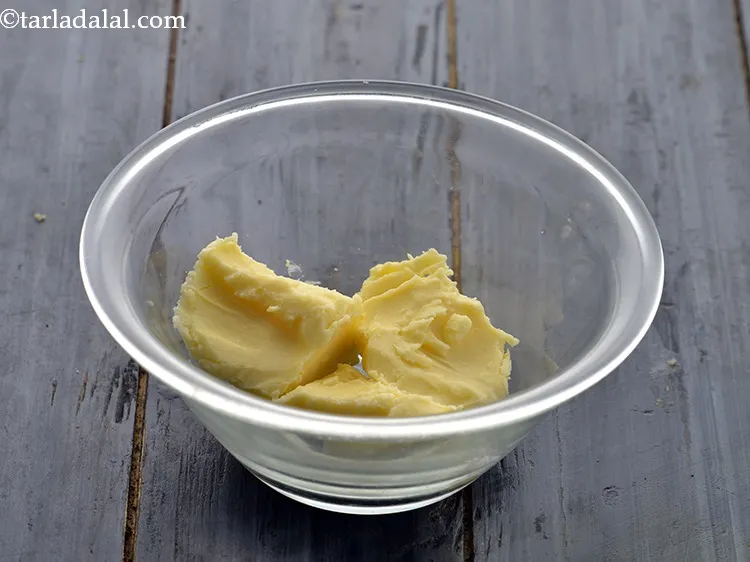 Step 4 – Now in a small bowl, take butter at room temperature. We have used regular salted …