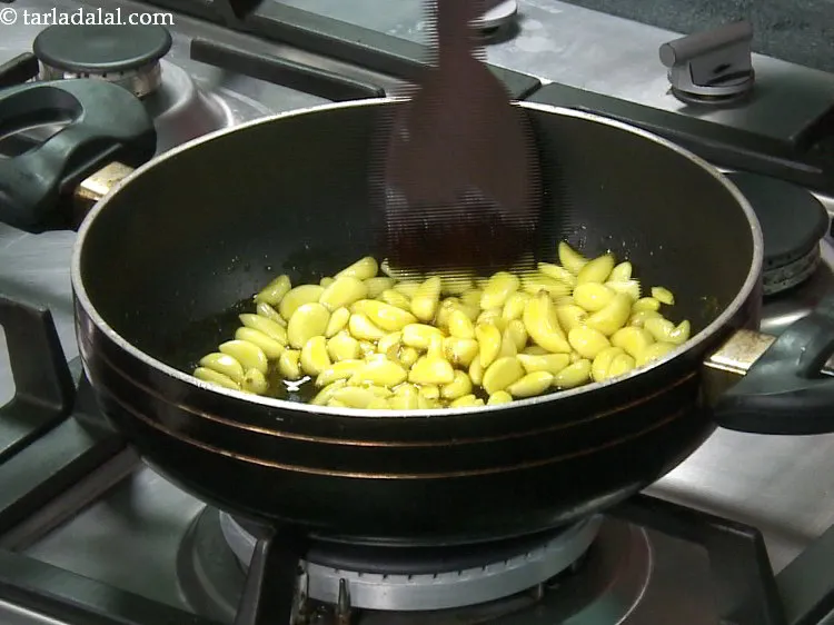 Step 10 – Saut&eacute; on a slow flame for 3 to 4 minutes or till they are soft …