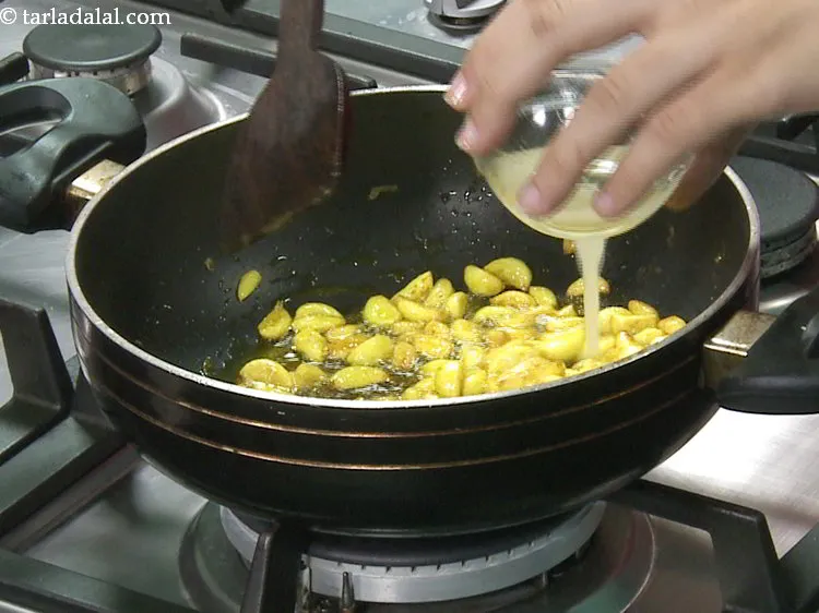 Step 11 – Add the lemon juice and cook on a slow flame for 2 to 3 minutes, …