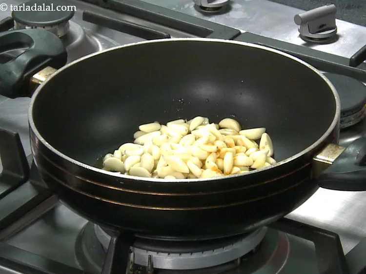 Step 9 – Add turmeric powder.