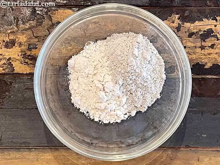 Step 6 – Add&nbsp;<meta charset="UTF-8" />1/4 cup&nbsp;<a href="glossary-bajra-flour-bajra-ka-atta-bajre-ka-atta-176i">bajra (black millet) flour</a>.&nbsp;<a href="https://www.tarladalal.com/recipes-using-bajra-flour-176">Bajra flour</a>&nbsp;is&nbsp;<a href="https://www.tarladalal.com/recipes-for-Protein-Rich-Foods-Indian-Veg-Protein-Rich-Recipes-695">high in protein</a>&nbsp;and is a&nbsp;<em>complete …