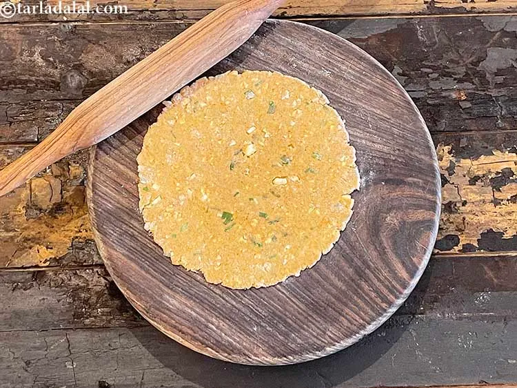 Step 17 – Roll out each portion of the dough into a 125 mm. (5&quot;) diameter circle using …