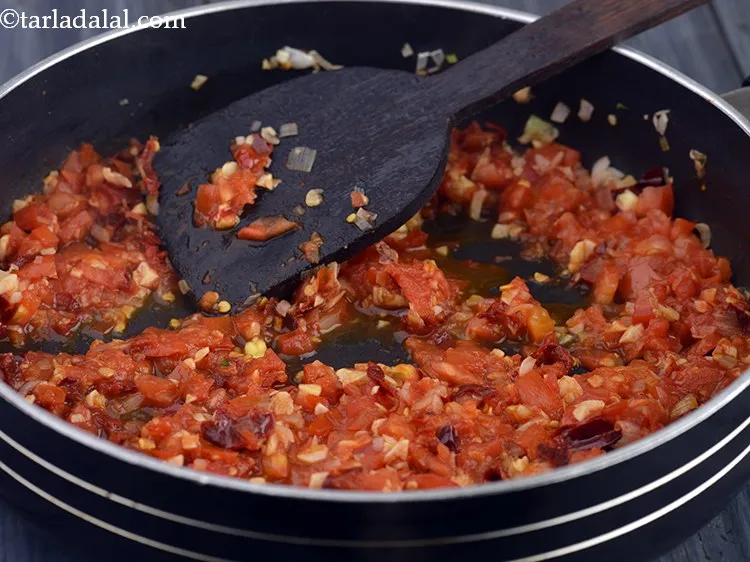 Step 30 – Mix well with the help of a ladle.&nbsp;