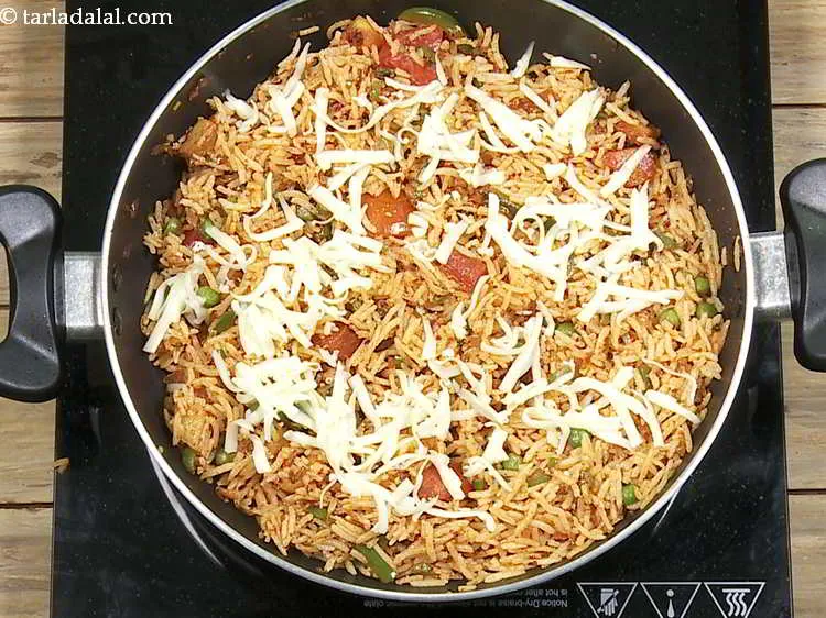 Step 28 – Remove from the flame, add the cheese and mix well. You can add more or …