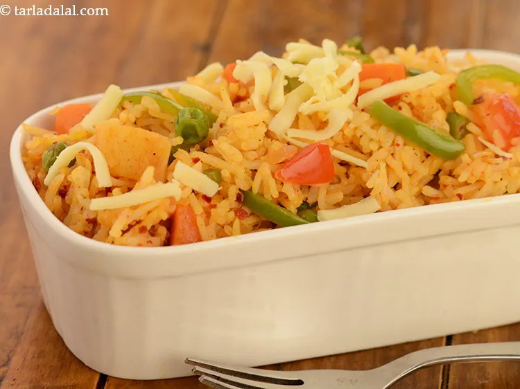 Step 29 – Serve&nbsp;<b><span style="font-size: 12pt; font-family: Cambria;">vegetable cheese rice | Indian style cheesy vegetable rice | garlic …