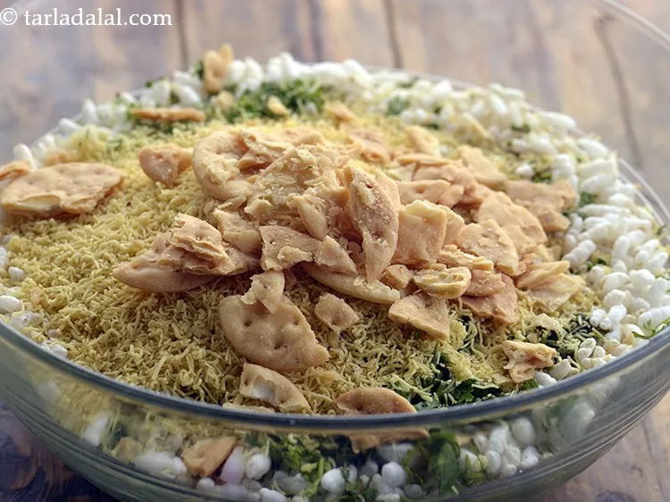 Step 45 – Add 4 tbsp&nbsp;<a href="https://www.tarladalal.com/glossary-crushed-papdi-2274i">crushed papdis</a>. Crush the papdis coarsely before adding for a good mouthfeel.&nbsp;