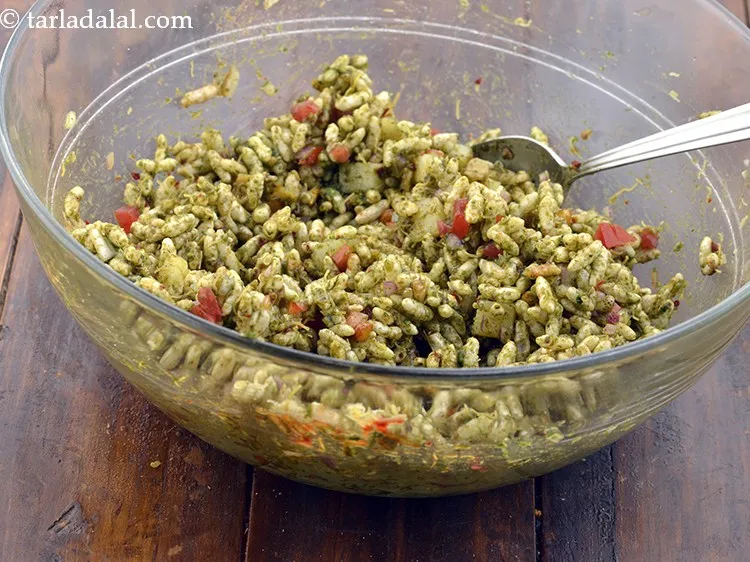 Step 47 – Mix well with hands. Mixing with spoon might not give a uniformly mixed bhel.&nbsp;