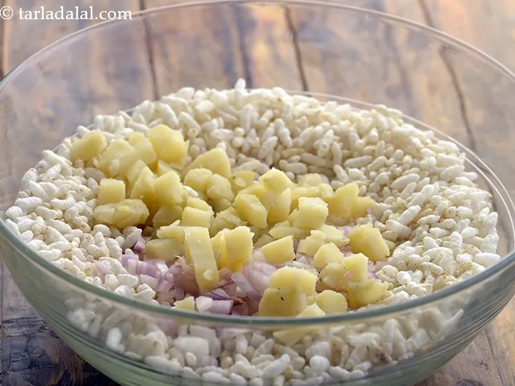 Step 37 – Add 1/4 cup&nbsp;<a href="https://www.tarladalal.com/glossary-boiled-and-chopped-potatoes-1879i">boiled , peeled and chopped potatoes</a>.