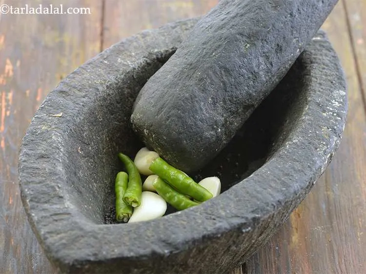 Step 4 – Now, add the green chilies to it.&nbsp;