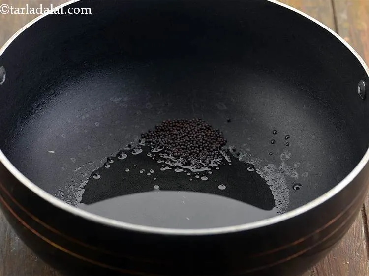 Step 11 – Add the mustard seeds.