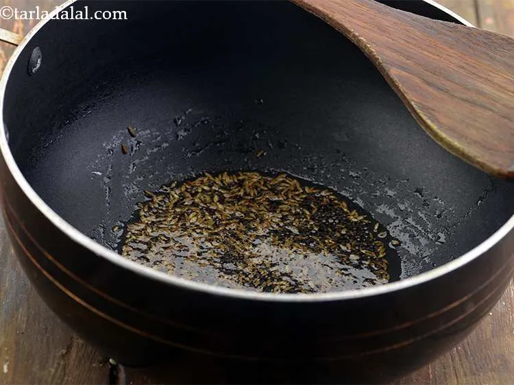 Step 12 – Now add the cumin seeds. Both cumin and mustard seeds are the soul of Odia …